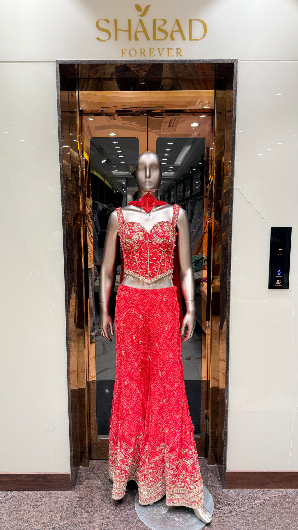 ZARI BANDHEJ CORSET WITH BELL BOTTOM