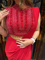 Red cut sleeve handwork blouse with georgette drape saree