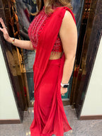 Red cut sleeve handwork blouse with georgette drape saree