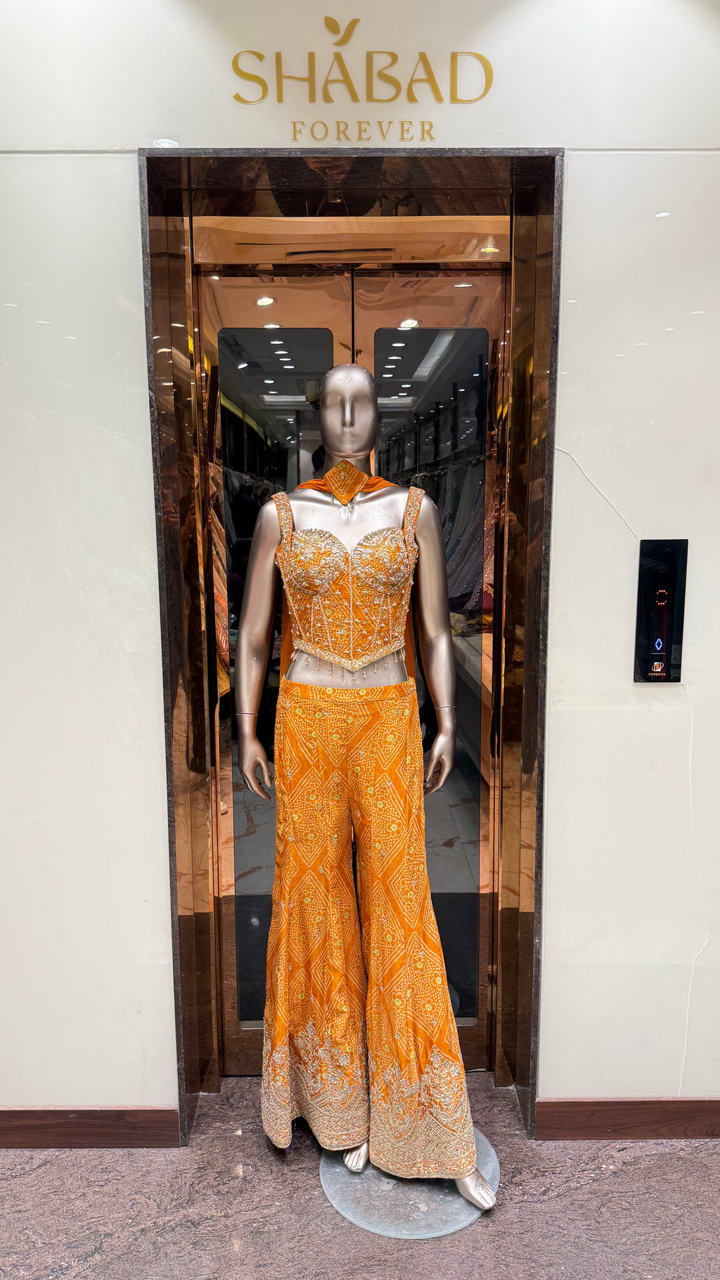 ZARI BANDHEJ CORSET WITH BELL BOTTOM