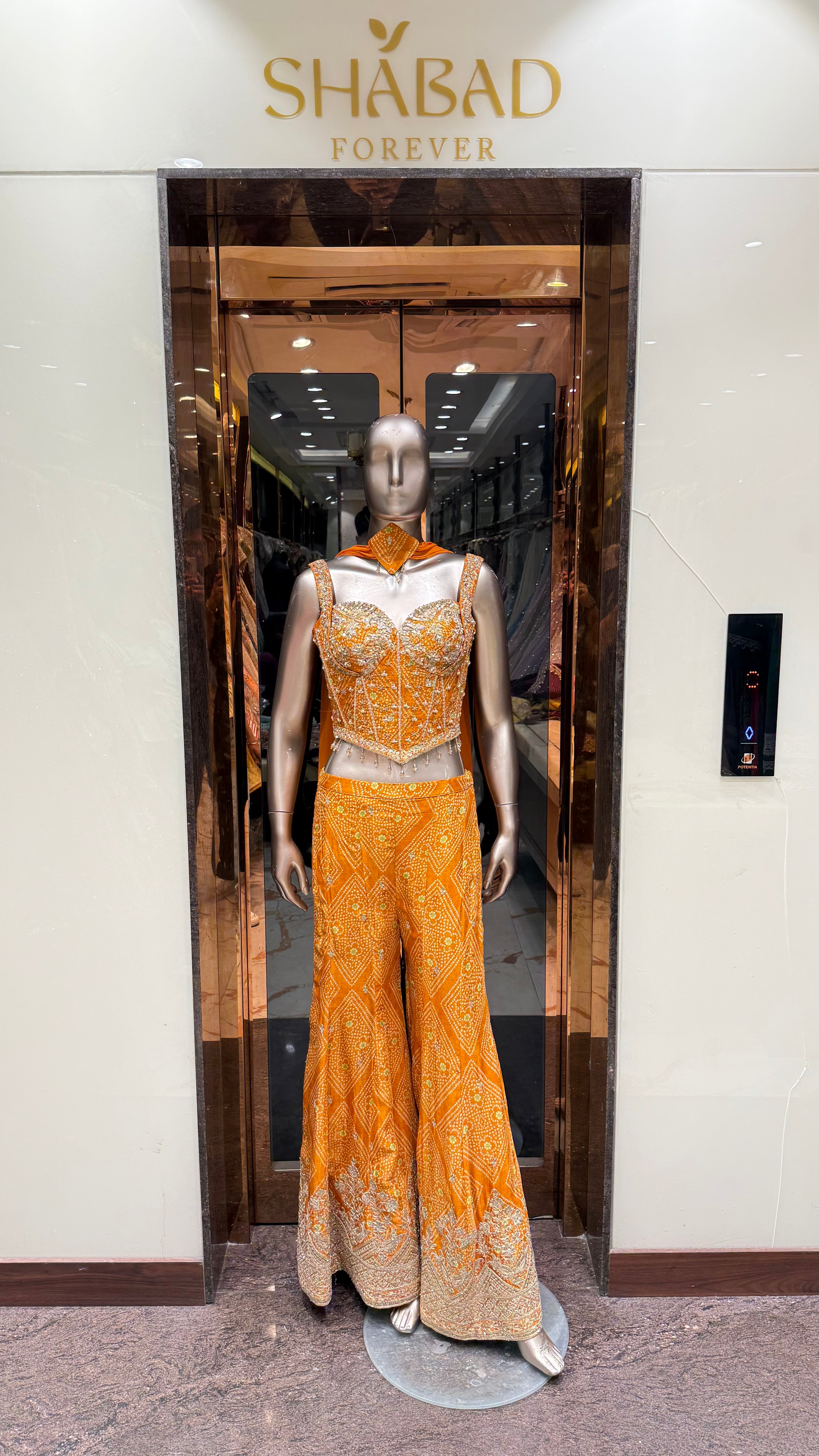 ZARI BANDHEJ CORSET WITH BELL BOTTOM