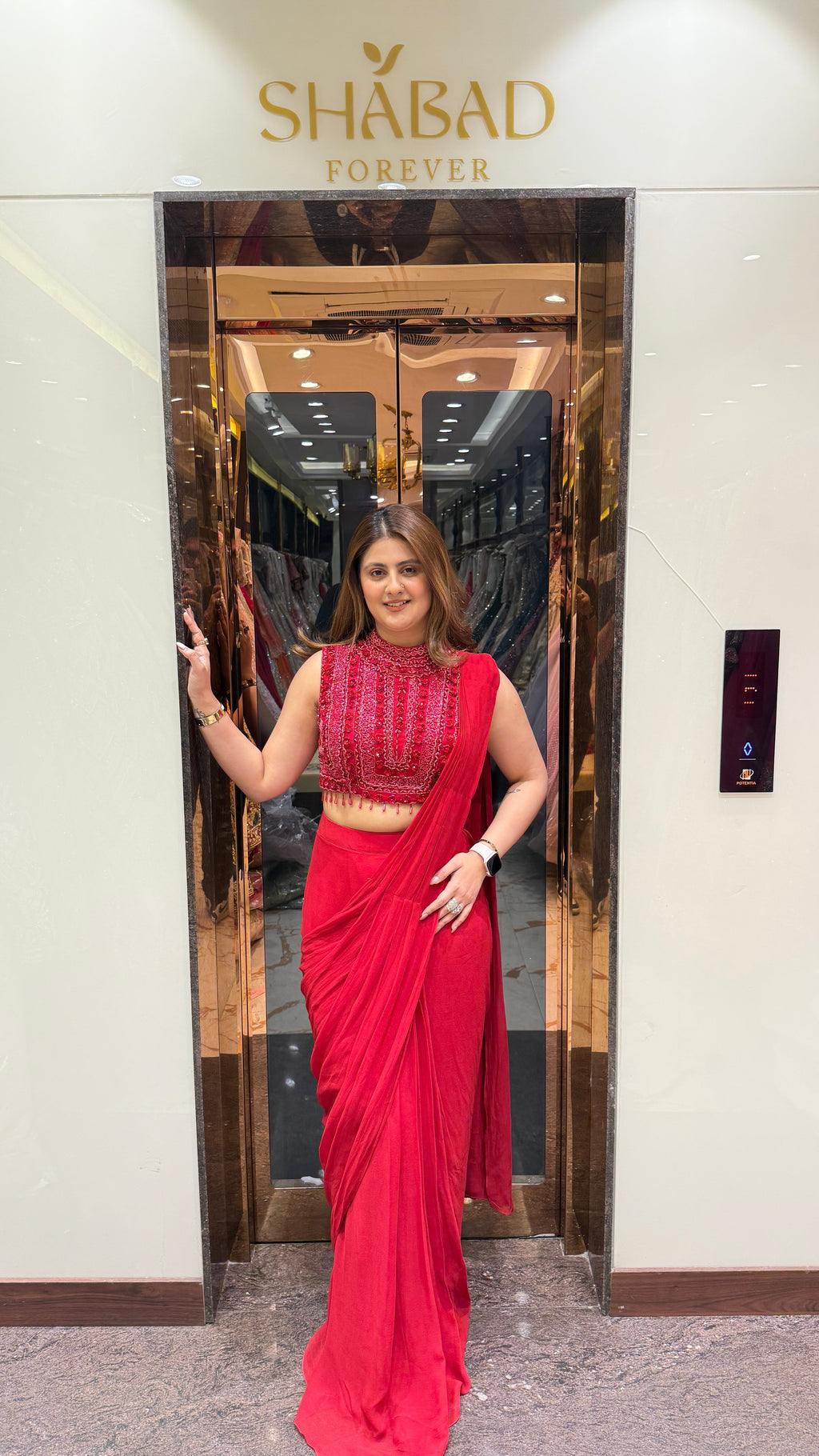 Red cut sleeve handwork blouse with georgette drape saree