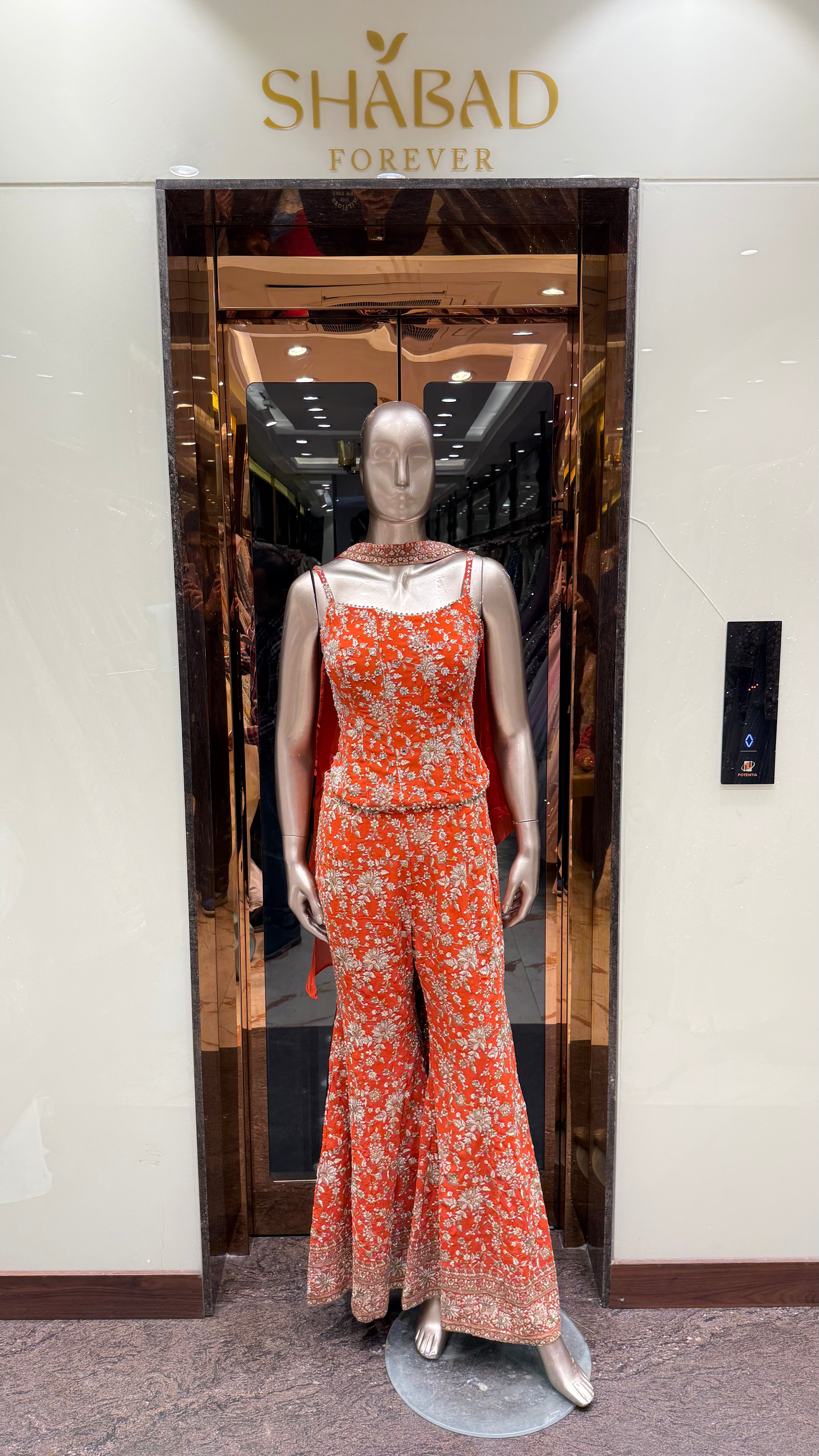 Thread and hand embroidered backless corset with pants and choker duppatta