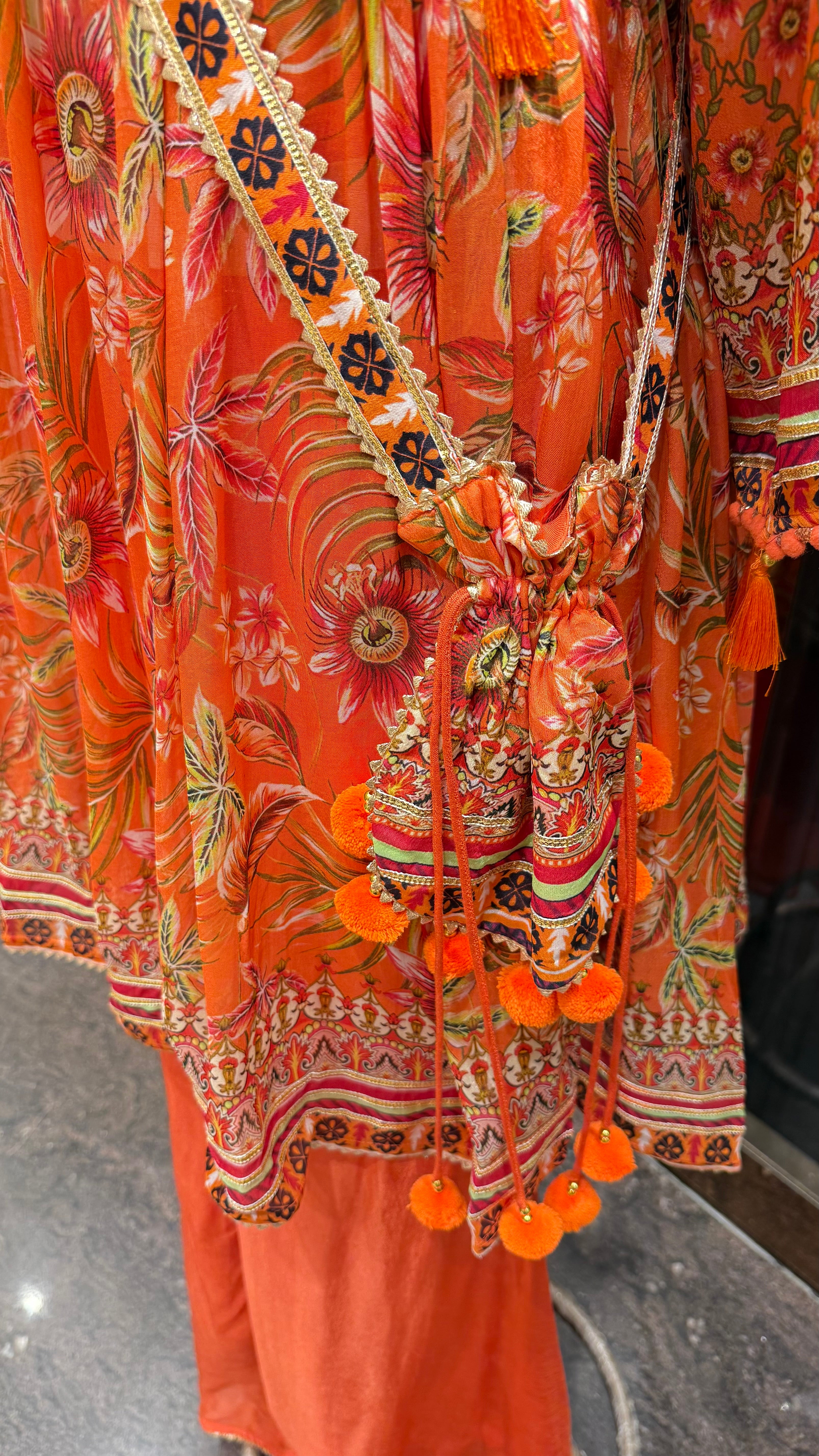 PRINTED PEPLUM KURTA WITH GHARARA & POTLI BAG
