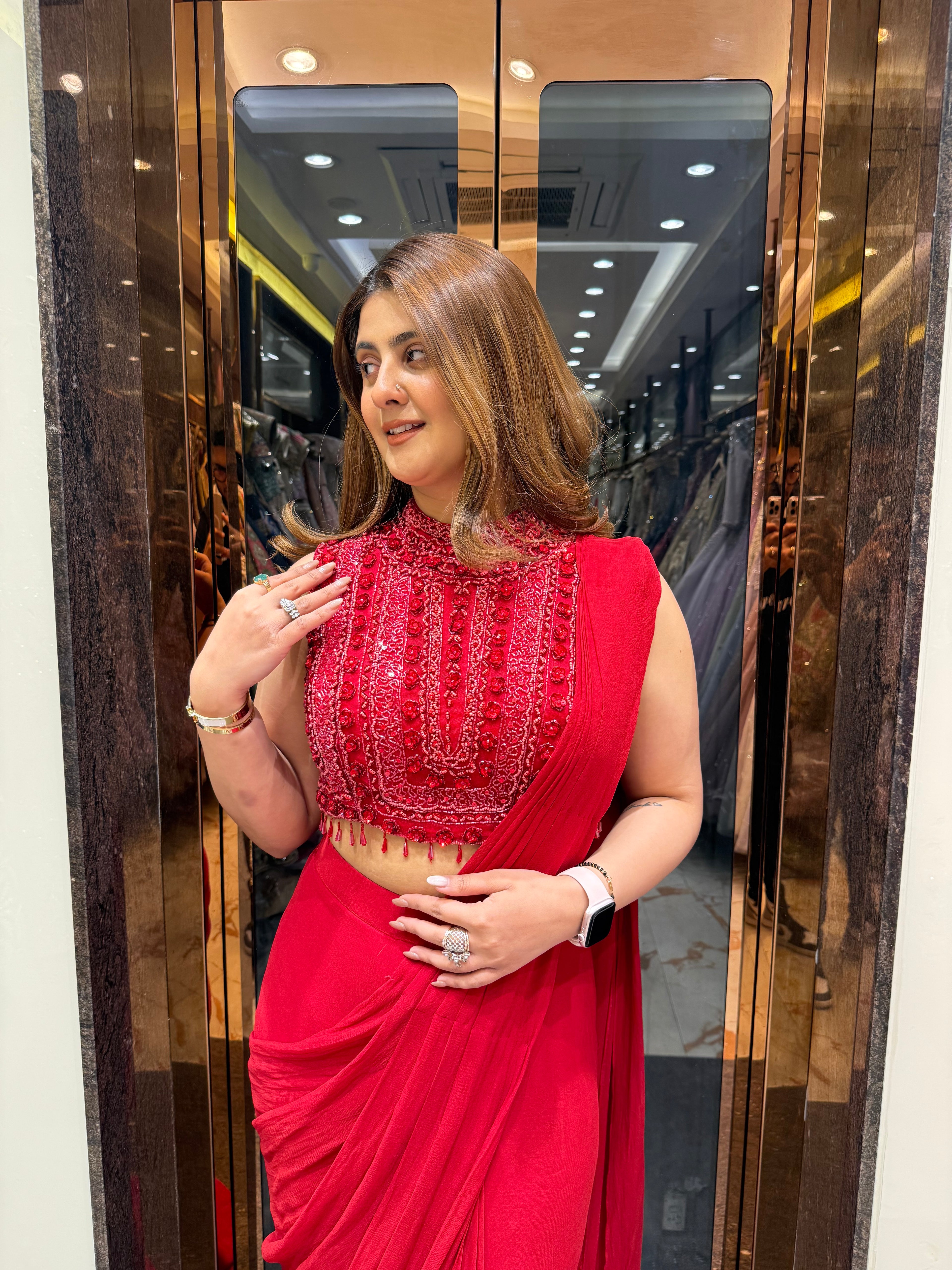 Red cut sleeve handwork blouse with georgette drape saree