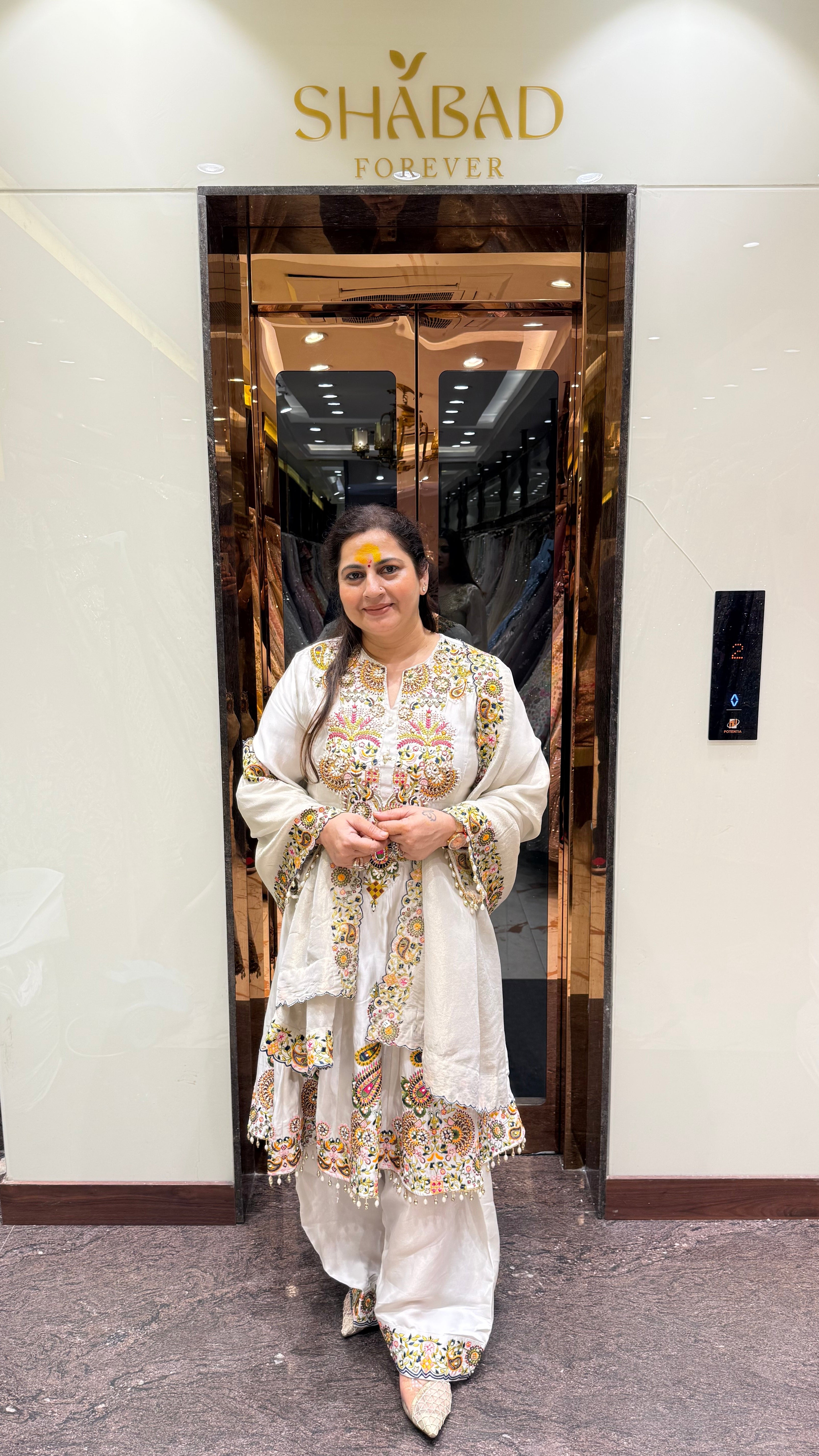 Kashmiri Multi-Thread Embroidered Peplum Suit With Pearl Detailing