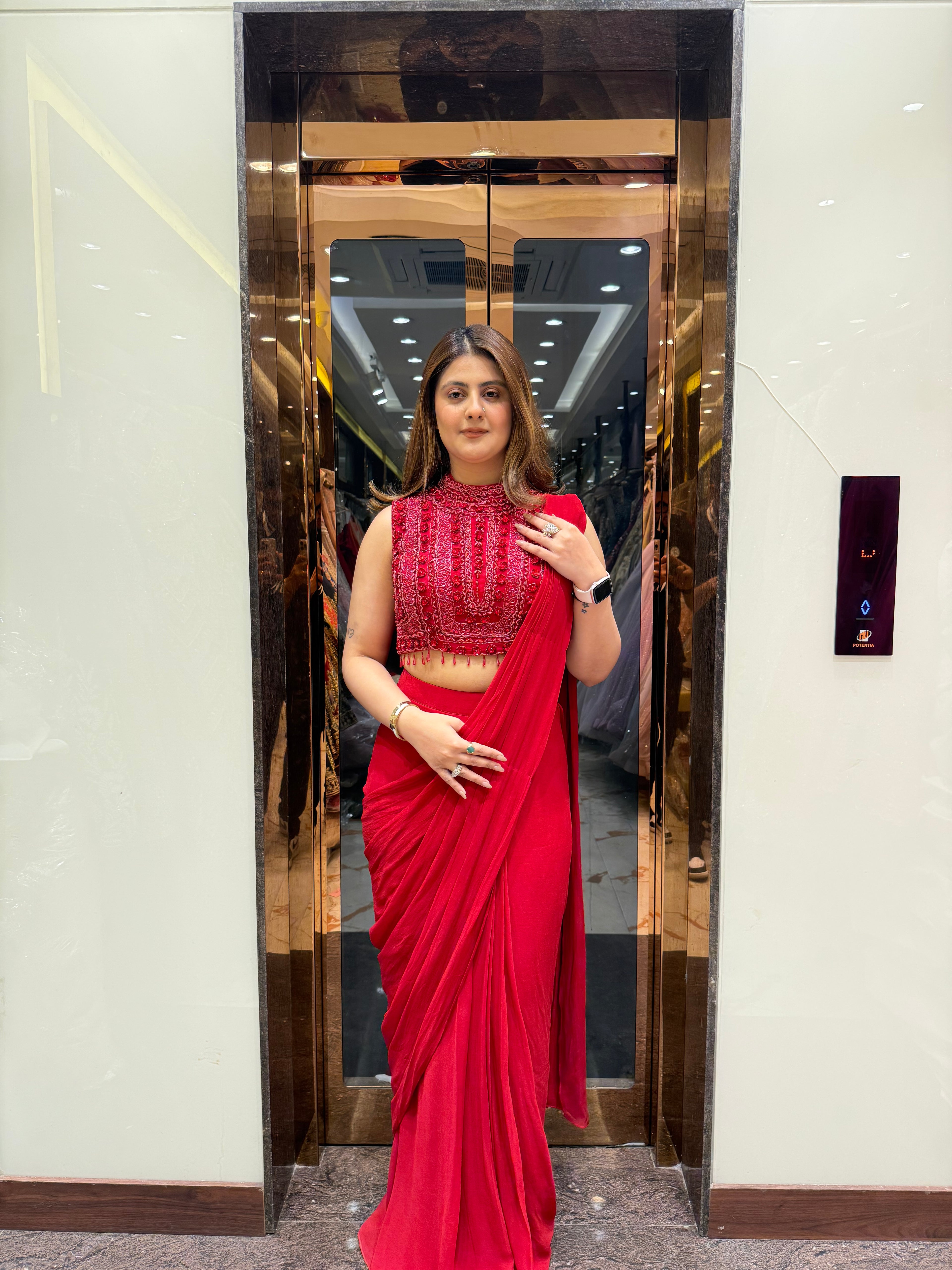 Red cut sleeve handwork blouse with georgette drape saree