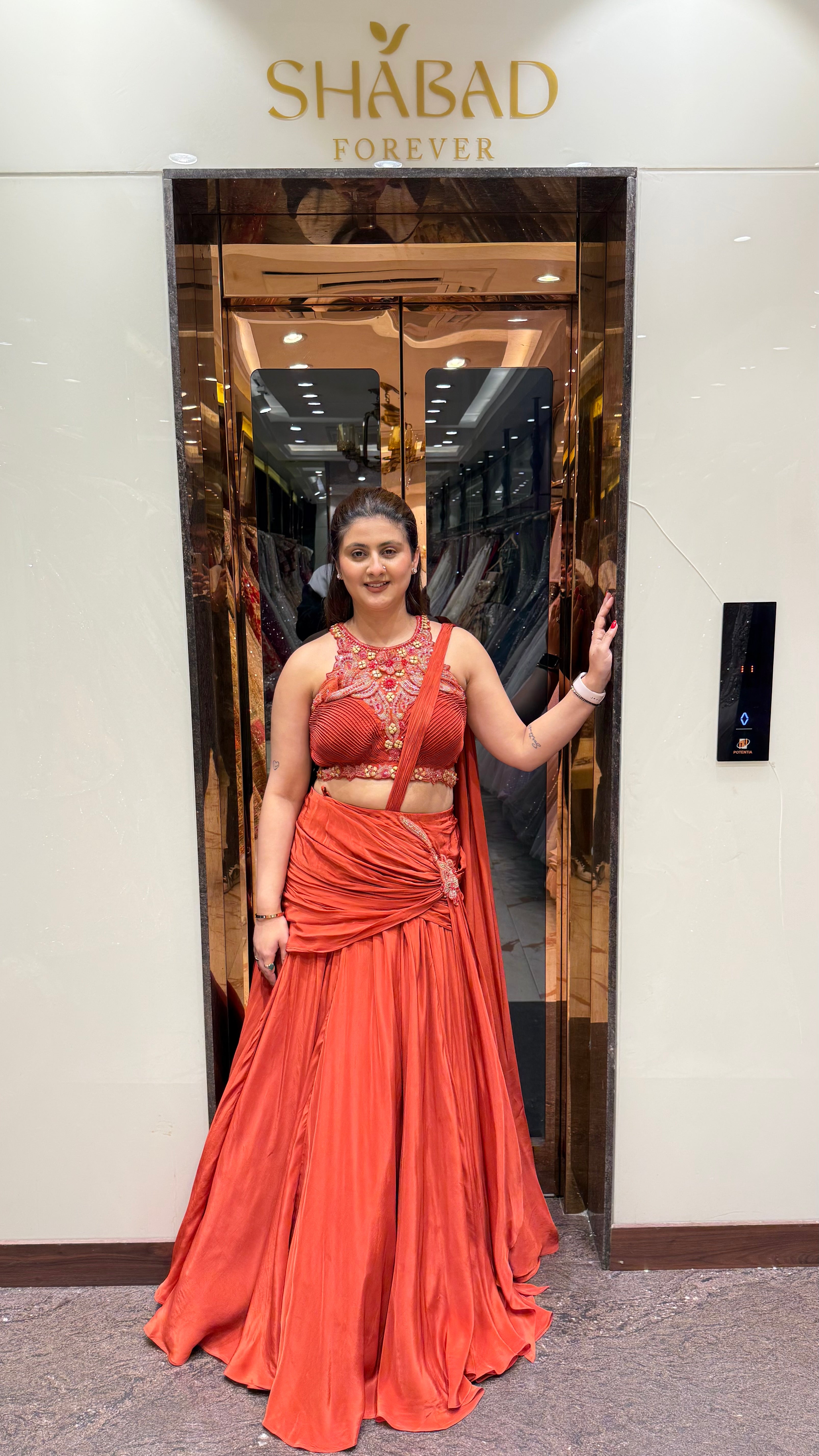 Chaarvi Rust Drape Saree