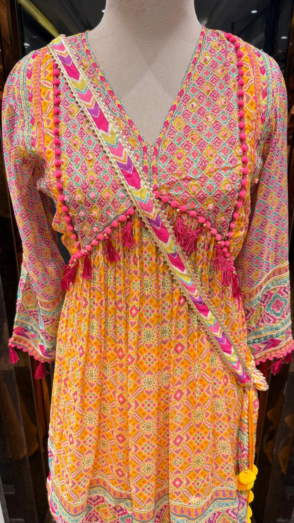 PRINTED PEPLUM KURTA WITH GHARARA & POTLI BAG