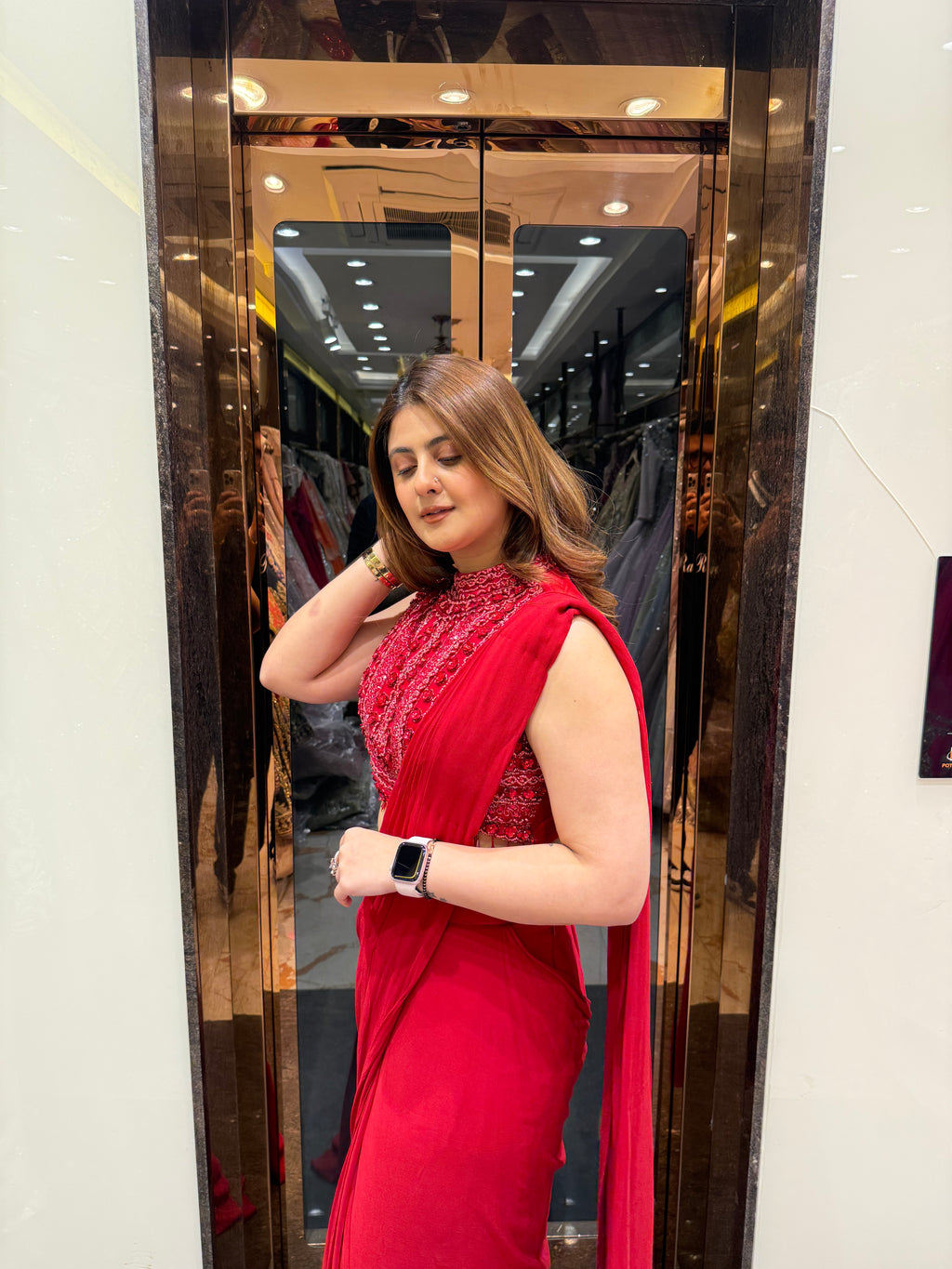 Red cut sleeve handwork blouse with georgette drape saree