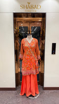 PRINTED PEPLUM KURTA WITH GHARARA & POTLI BAG