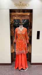 PRINTED PEPLUM KURTA WITH GHARARA & POTLI BAG