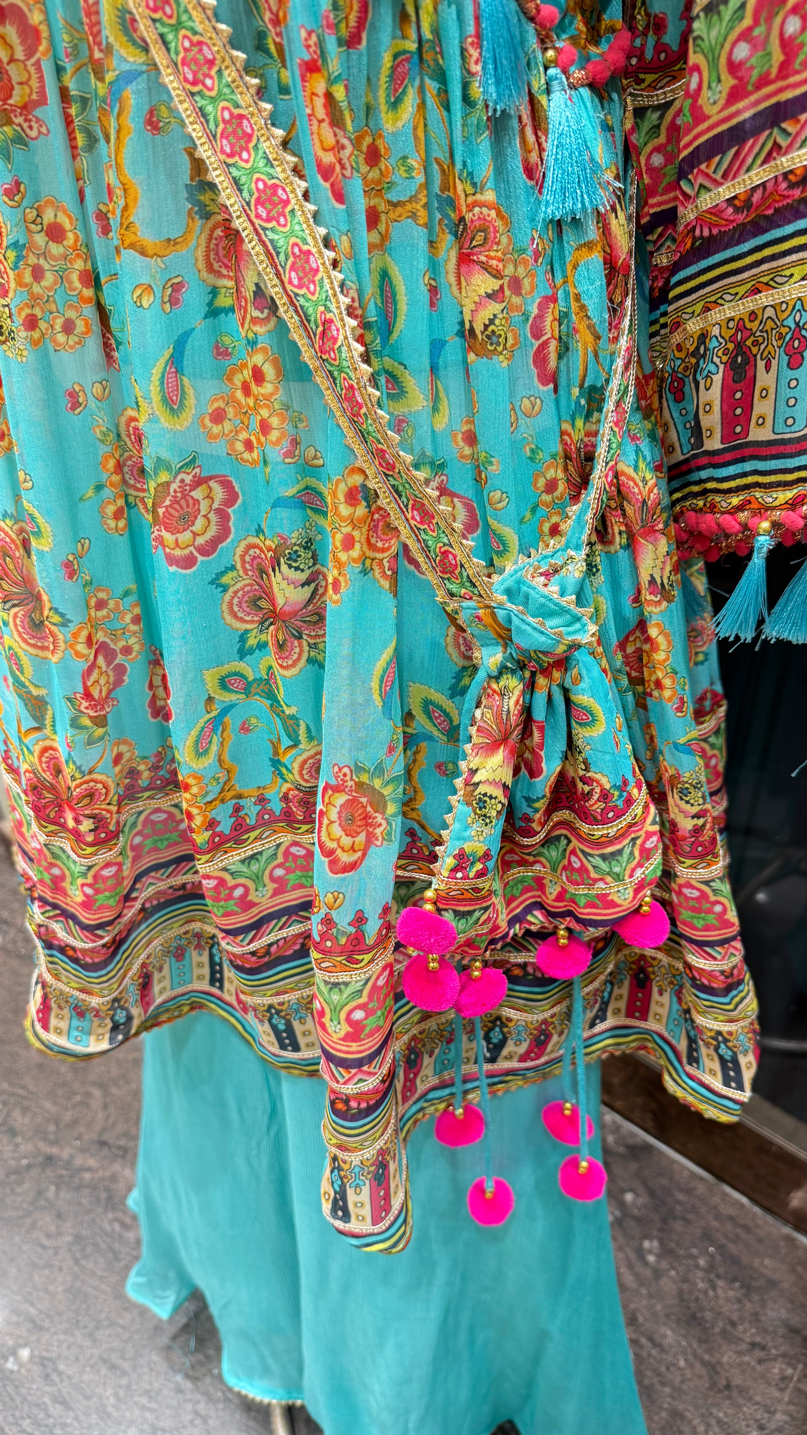 PRINTED PEPLUM KURTA WITH GHARARA & POTLI BAG