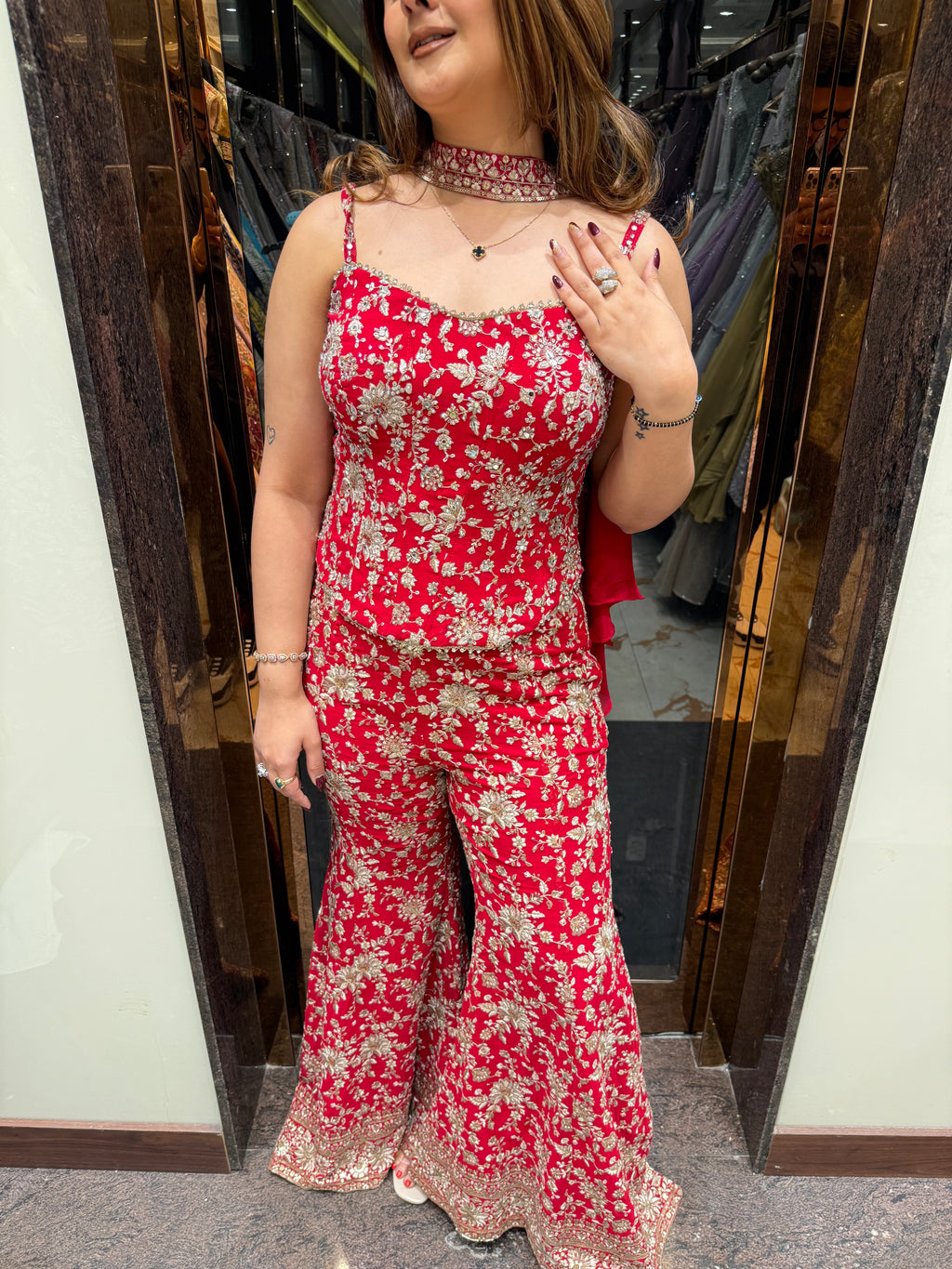 Thread and hand embroidered backless corset with pants and choker duppatta
