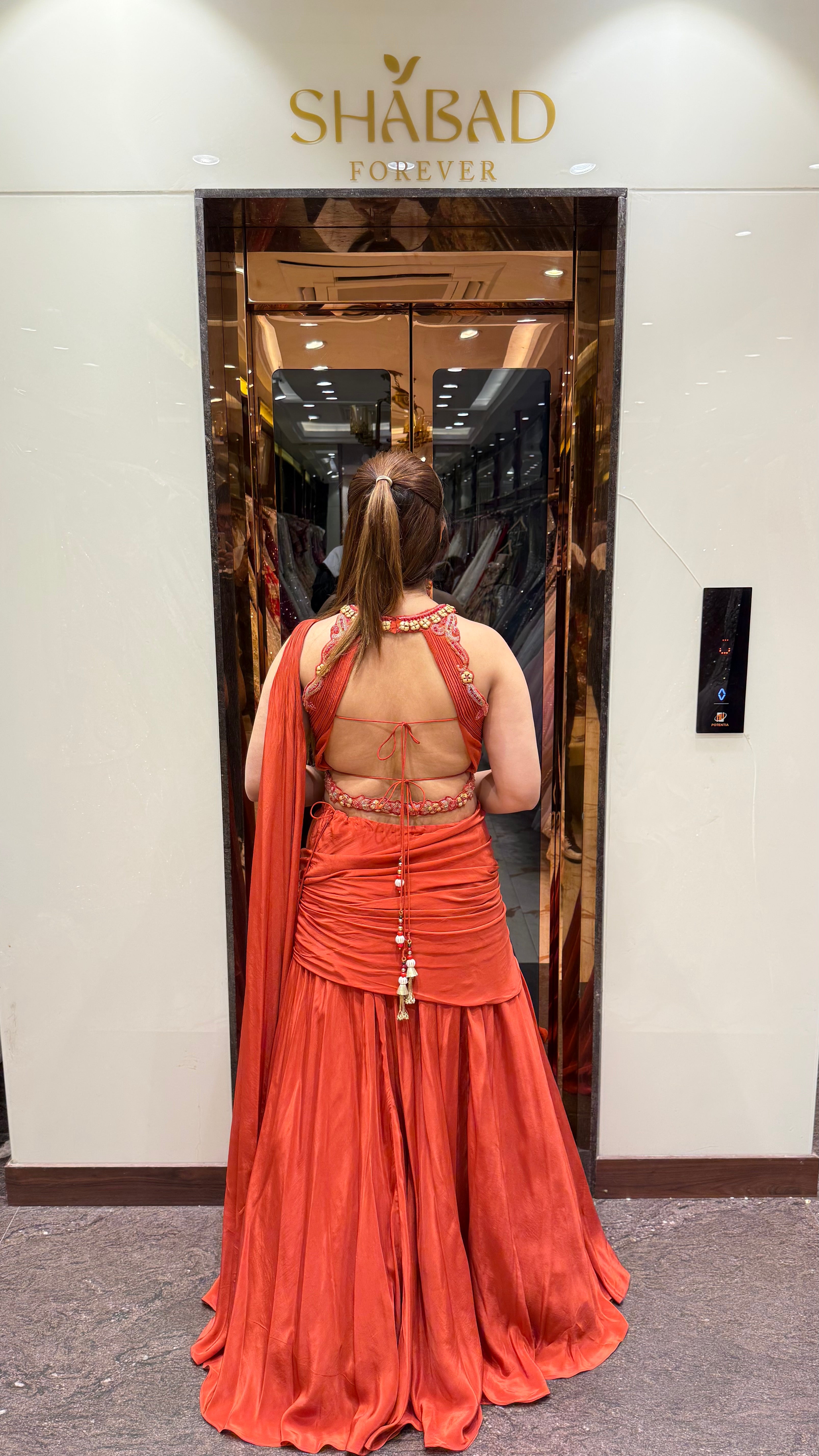 Chaarvi Rust Drape Saree