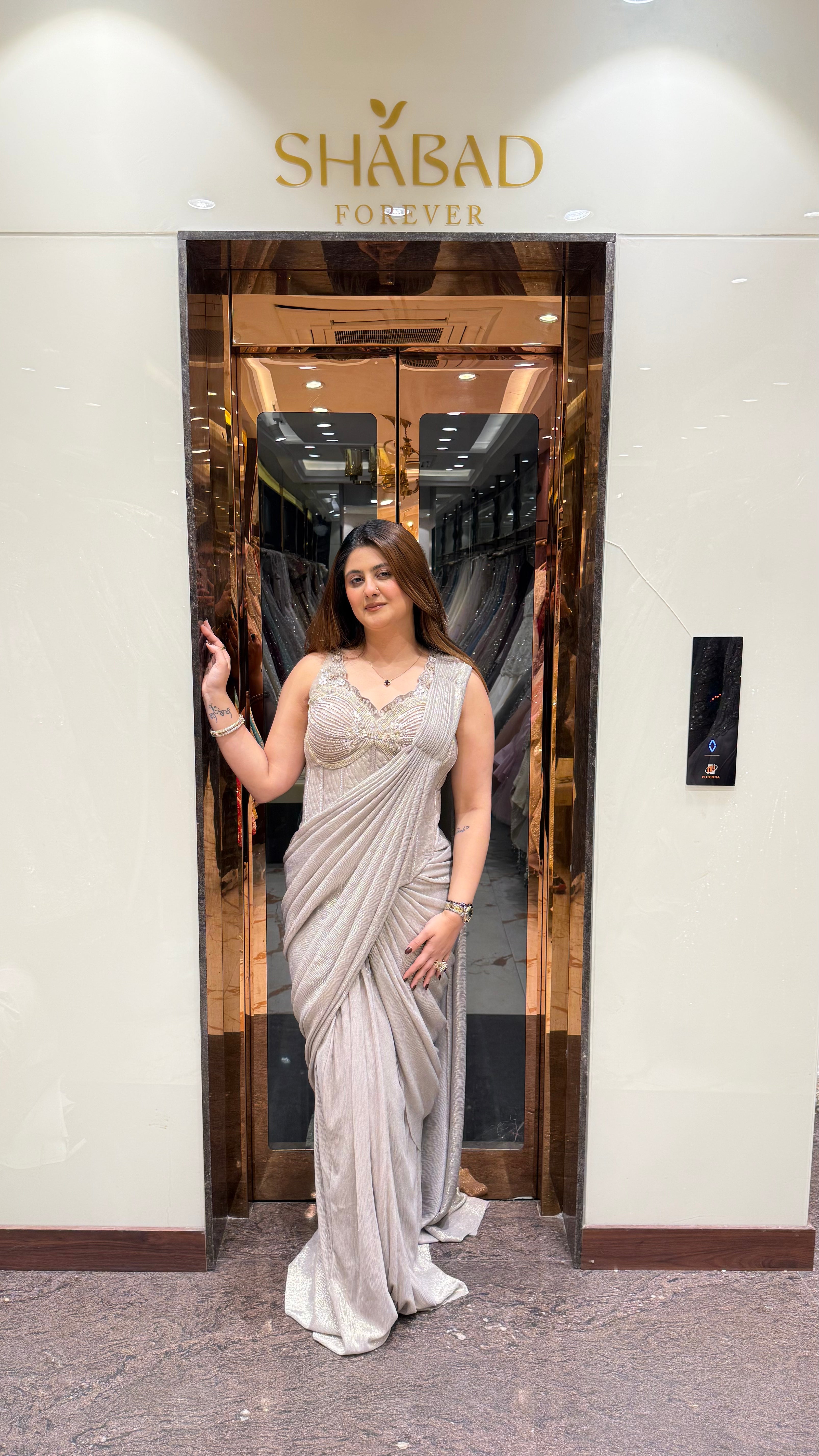 Grey Shimmer Lycra Drape Saree With Handwork Corset Blouse